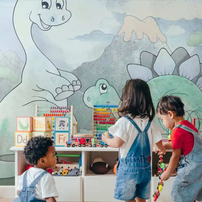 Bestseller Fototapet - Dinozauri pentru copii - Diplodocus și Stegosaurus pe fundalul unui vulcan